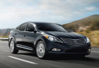 Hyundai Azera (2014) vs Kia Cadenza Premium (2014): What is the difference?
